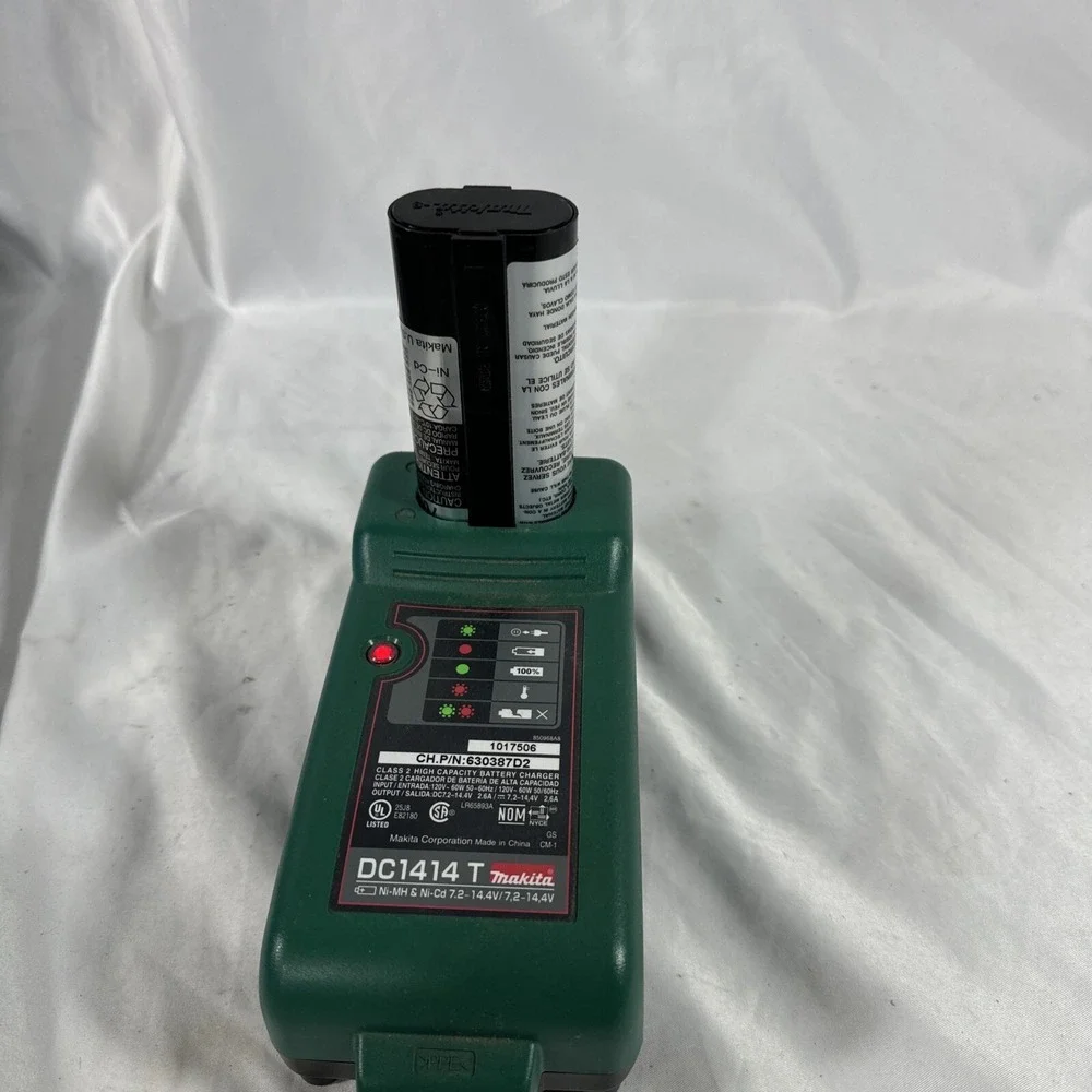 Makita Drill Set Light, Battery Charger Works/ Needs New Battery Drill Is Slow